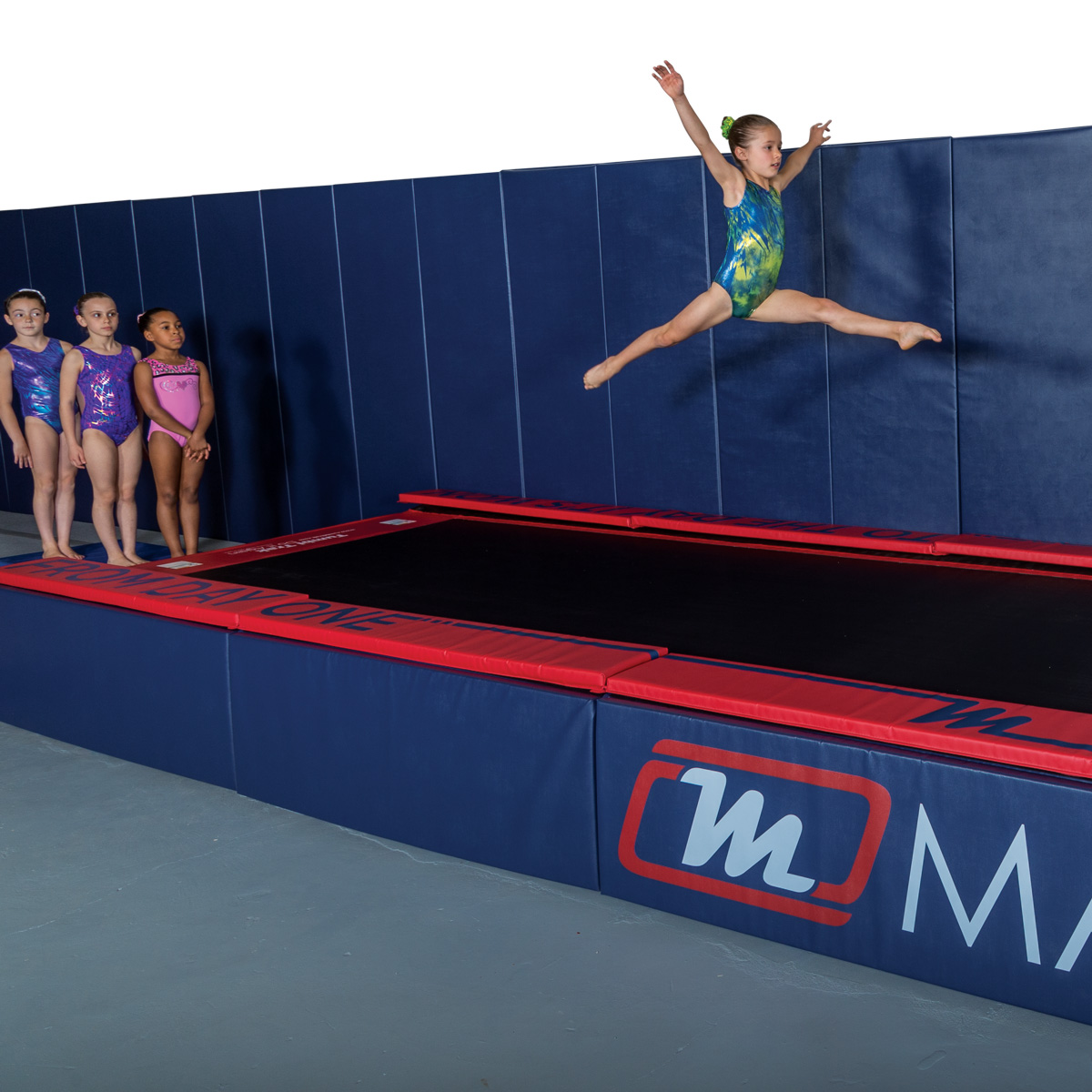 tumbl trak side skirt padded panels with gymnasts top pads and removable wall padding mats - mancino mats