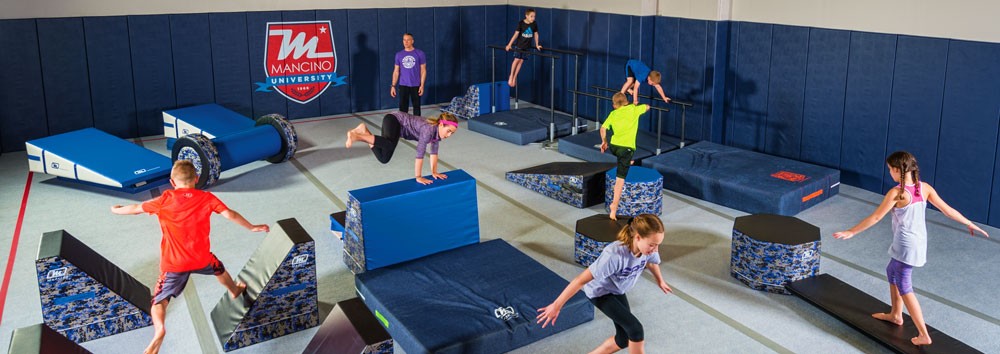 Gymnastics training with flor and wall mat